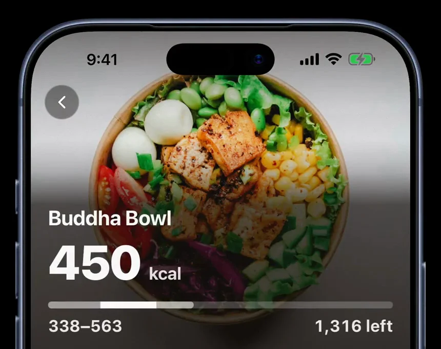 The app finishing a scan of a Buddha Bowl: it reports 450 kcal, and prints the 338–563 kcal range that number came from.
